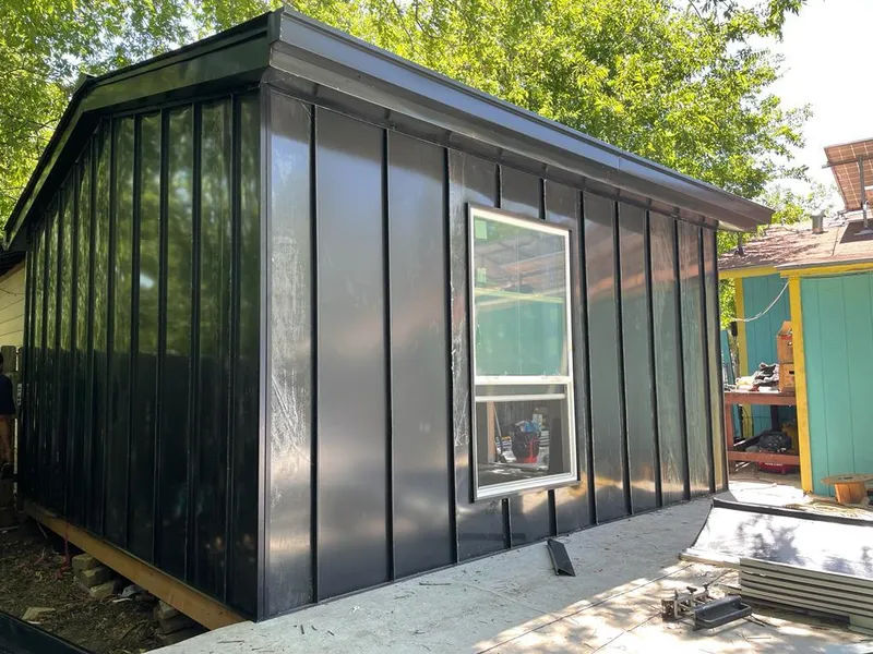 Black standing seam metal wall panels for Roof Inspection in Crescent City